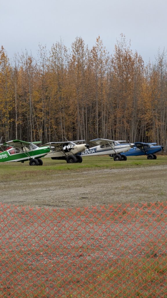planes parked in a row at Bradley Airport, North Pole, Alaska